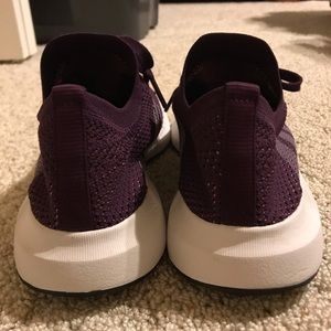 Purple Adidas tennis shoes